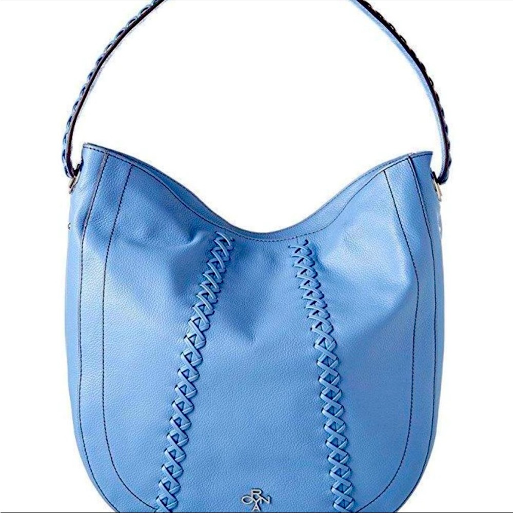 New with tags Oryany purse, size large , color sky blue. Gorgeous leather purse